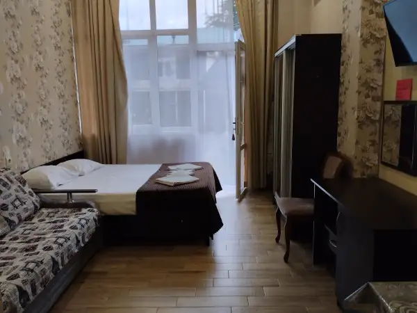 Семейный де-люкс с кухней №104